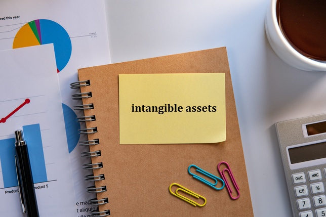 There is sticky note with the word intangible assets. It is as an eye-catching image.